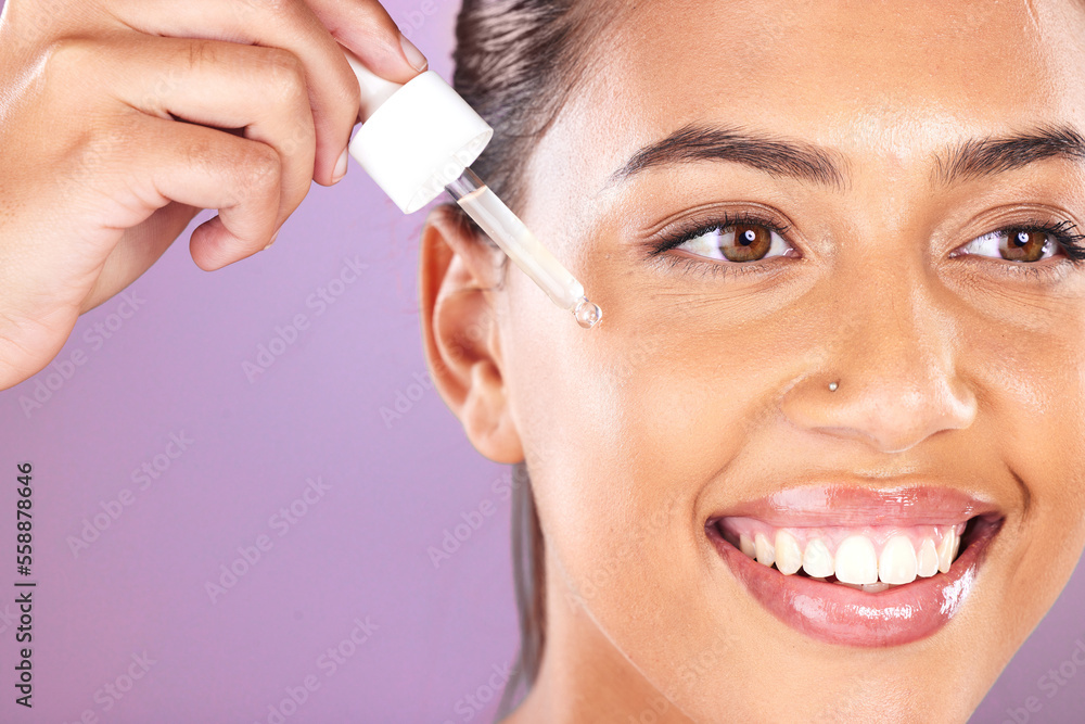 Woman, facial essential oil and serum for dermatology, natural beauty and aesthetic makeup on purple studio background. Happy model face, skincare and liquid cosmetics, retinol and hyaluronic acid Woman, facial essential oil and serum for dermatology, natural beauty and aesthetic makeup on purple studio background. Happy model face, skincare and liquid cosmetics, retinol and hyaluronic acid