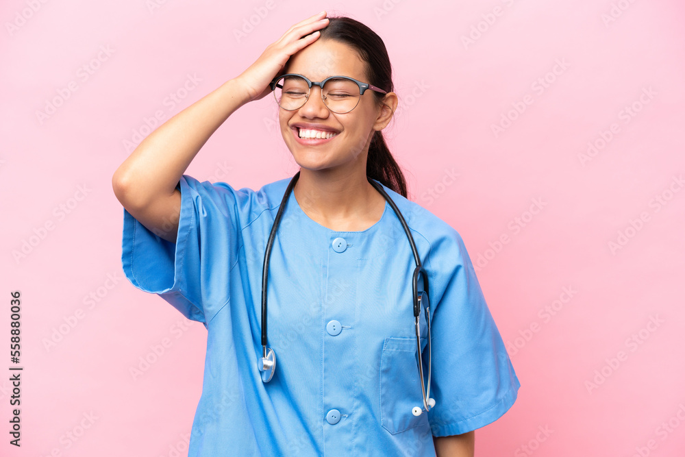 Young nurse Colombian woman isolated on pink background has realized something and intending the solution Young nurse Colombian woman isolated on pink background has realized something and intending the solution