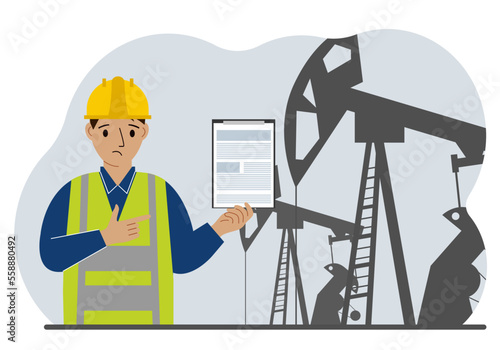 A male refinery engineer worker uses a tableted oil pumping unit. Energy industrial zone, oil drilling.