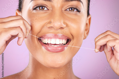 Woman portrait, face or flossing teeth on studio background in hygiene mouth maintenance, self care grooming or healthcare wellness routine. Zoom, happy smile or beauty model in dental floss cleaning