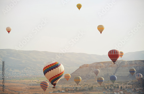 Hot air balloons flying over Cappadocia photo