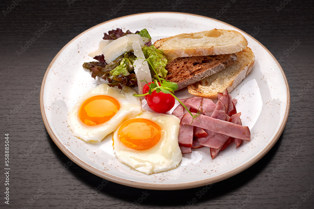 Fried eggs with ham, cheese and toast Fried eggs with ham, cheese and toast