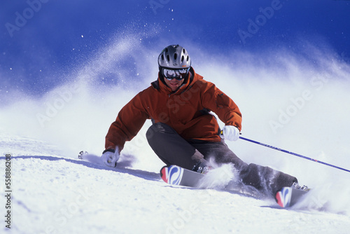 Man carving on his skis at Alta, Utah