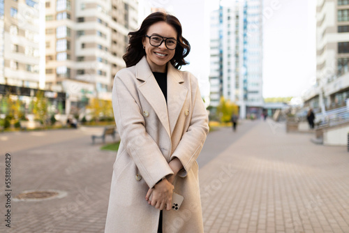 Εκτύπωση καμβά modest business woman with a smile looks at the camera on the background of the