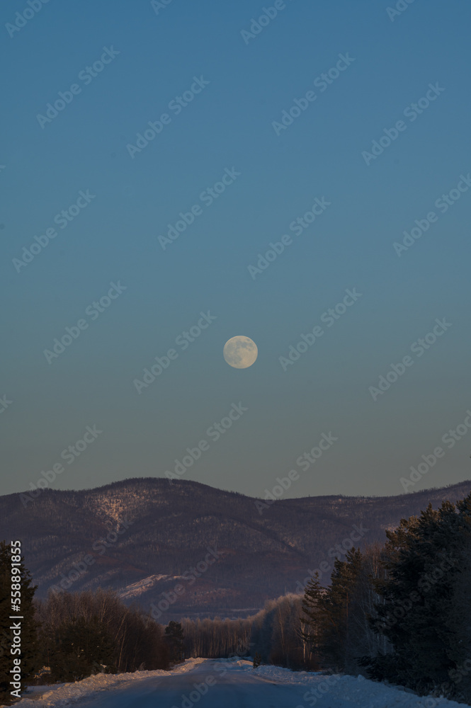 the moon over the hills and the road the moon over the hills and the road