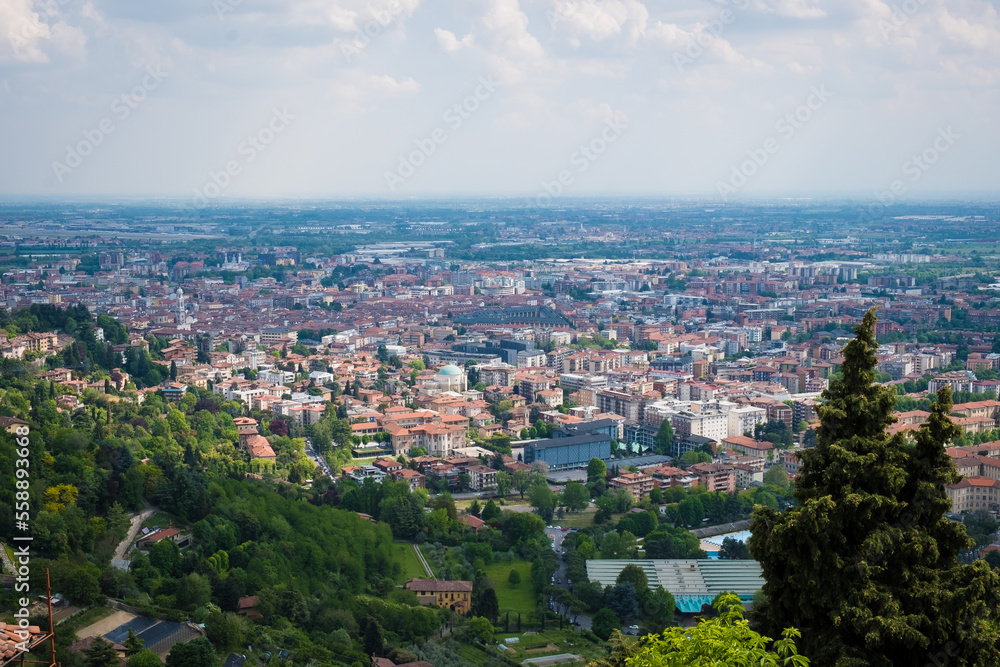 Aerial view over the city of Bergamo from San Vigilio mountain. Overlooking the city of Bergamo. Aerial view over the city of Bergamo from San Vigilio mountain. Overlooking the city of Bergamo.