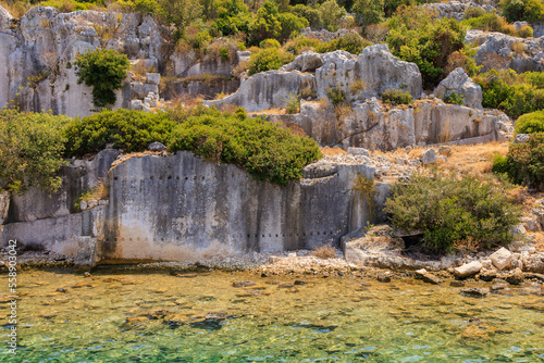 The ruins of a sunken ancient city on the island of Kekova Lycian Dolichiste in Turkey in the province of Antalya photo