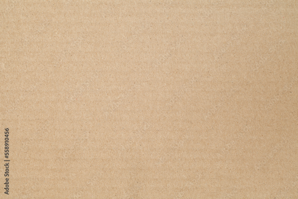 Fototapeta premium Cardboard surface, beige paper structure, rough background of recycled waste paper