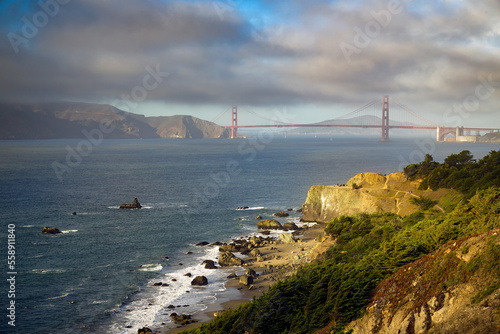 Mile Rock Beach and Lands End Lookout with the Golden Gate Bridge in the distance at San Francisco.