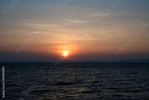sunset over the sea © Tongsai Tongjan
