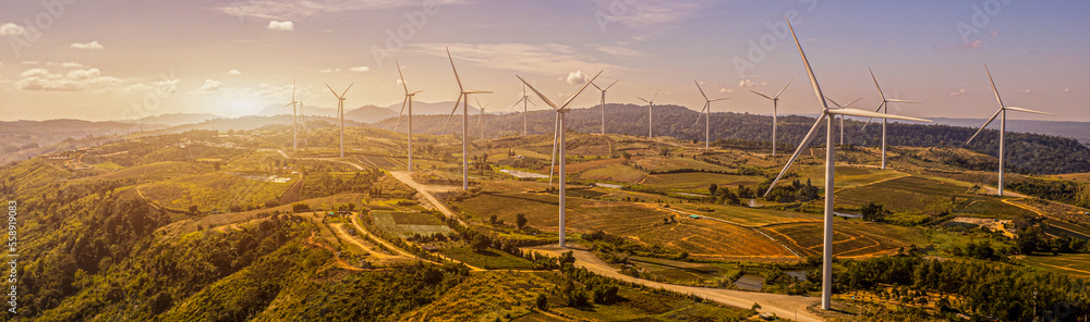 wind turbines in a field, wind turbine farm sundown, Wind Power Turbines in a rural area, Tracking shot of energy producing wind turbines in Oregon. wind turbines in a field, wind turbine farm sundown, Wind Power Turbines in a rural area, Tracking shot of energy producing wind turbines in Oregon.