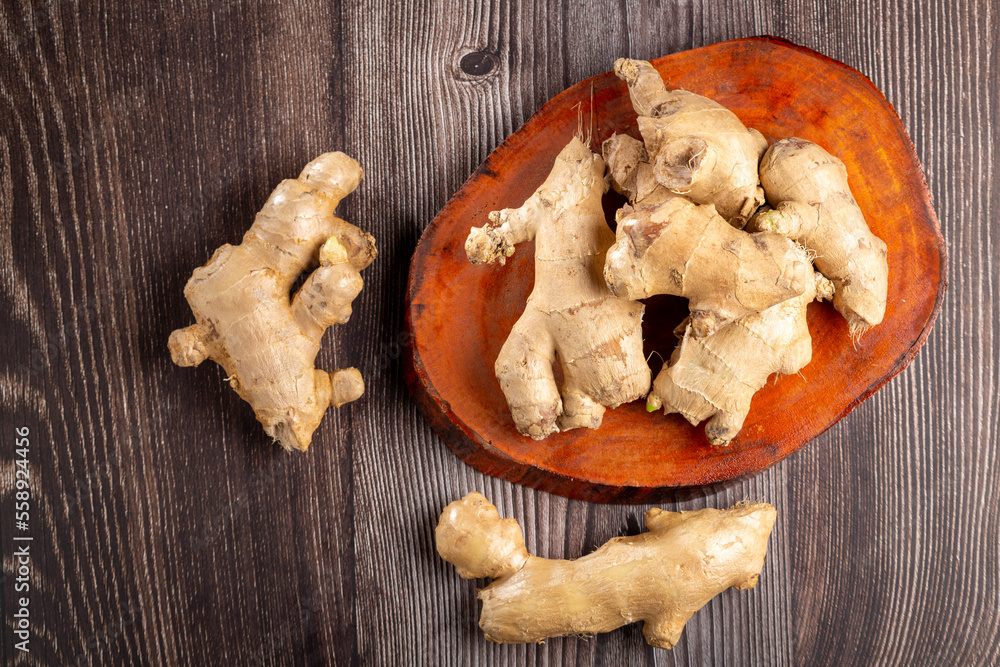Fototapeta premium Organic fresh ginger root on the table.