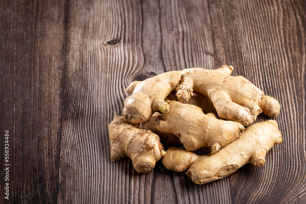Organic fresh ginger root on the table. Organic fresh ginger root on the table.