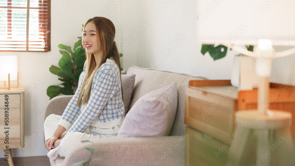 Leisure time concept, Women are sitting on comfortable couch to spending relax time with happiness Leisure time concept, Women are sitting on comfortable couch to spending relax time with happiness