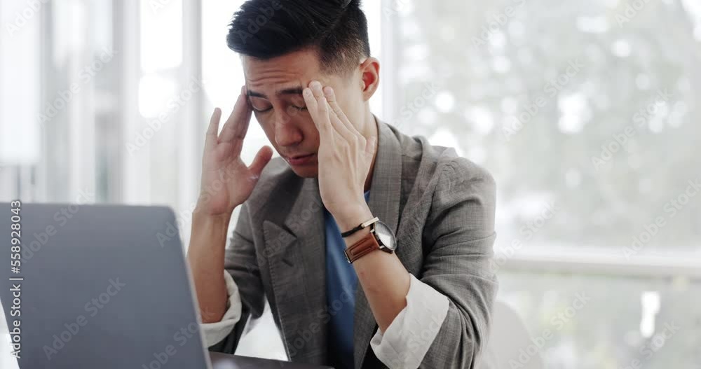 Asian businessman headache, laptop and tired face in communication office at marketing company. Man, computer and mental health with burnout, target or kpi at digital marketing agency on web in Tokyo Asian businessman headache, laptop and tired face in communication office at marketing company. Man, computer and mental health with burnout, target or kpi at digital marketing agency on web in Tokyo