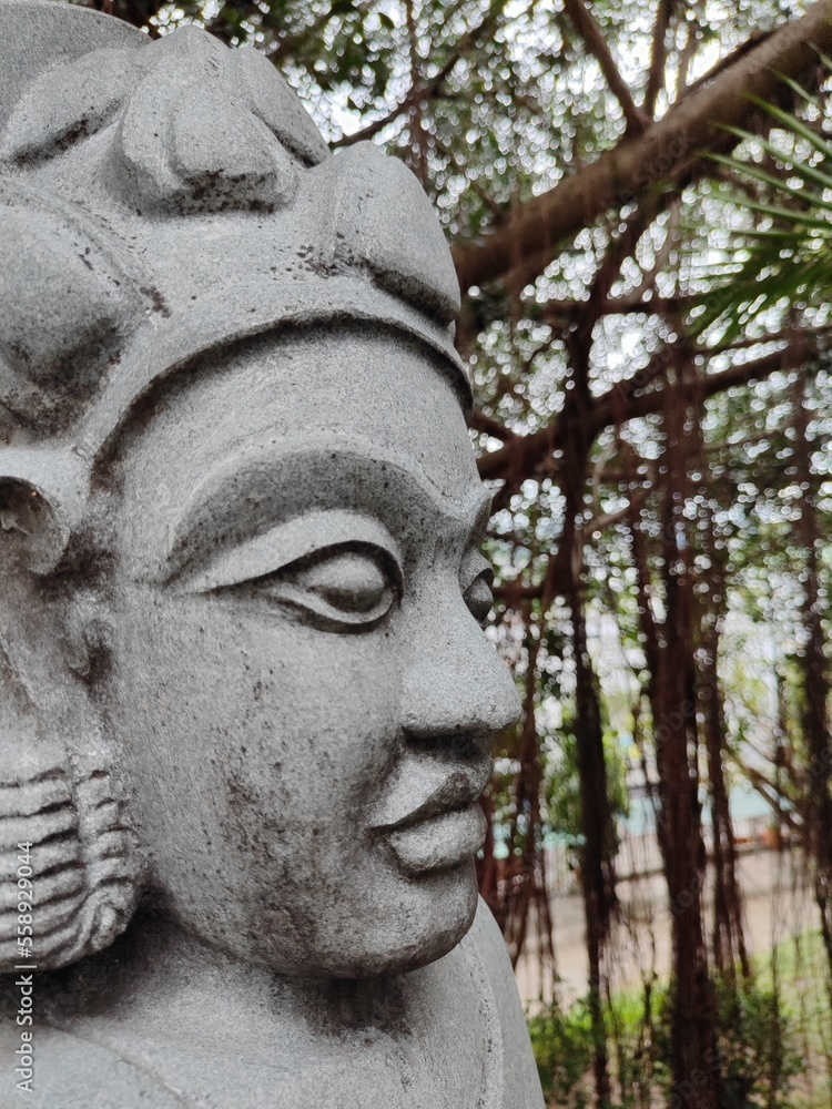 Image of a Buddhist deity in stone Image of a Buddhist deity in stone