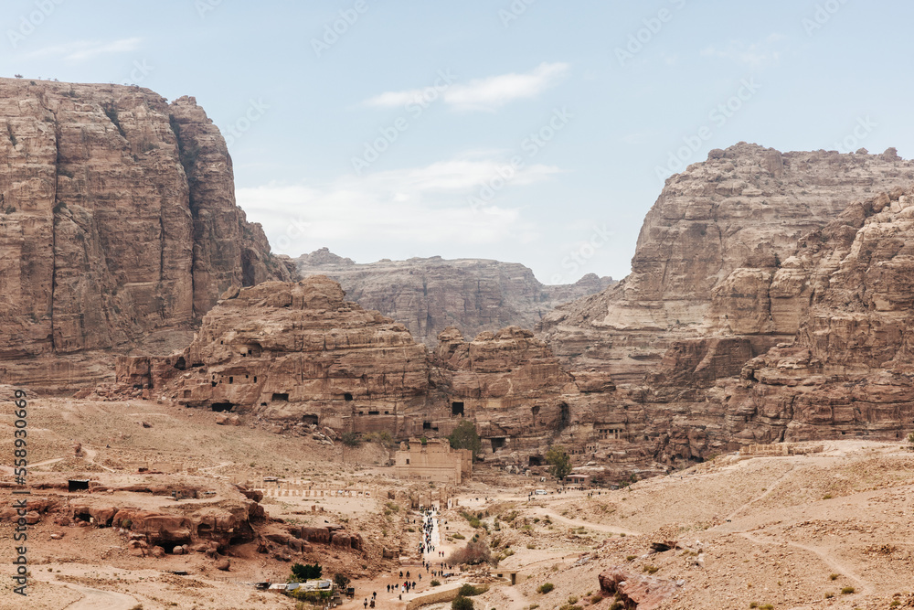 Stone tombs carved into the mountain in the ancient city of Petra in Jordan