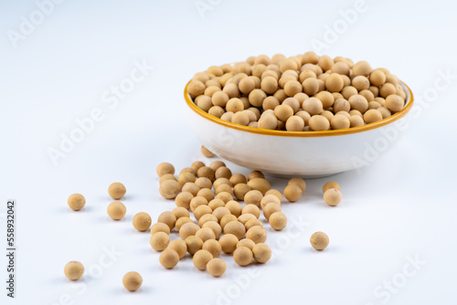 Pile of soybean on white surface