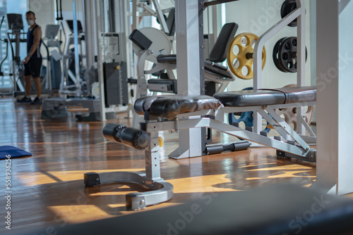 man and women exercise in the gym