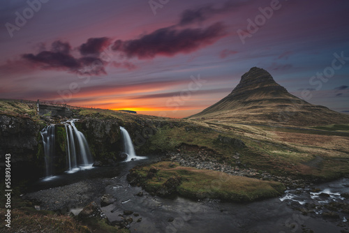 kirkjufellsfoss waterfall in iceland during sunset. Landscape, nature and scenery concept.