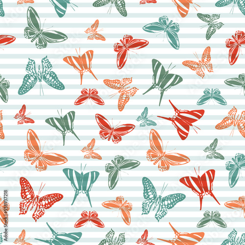 Flying butterfly silhouettes over striped background vector seamless pattern.