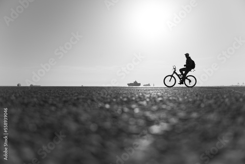 Silhouette of a male biker (ID: 558939046)