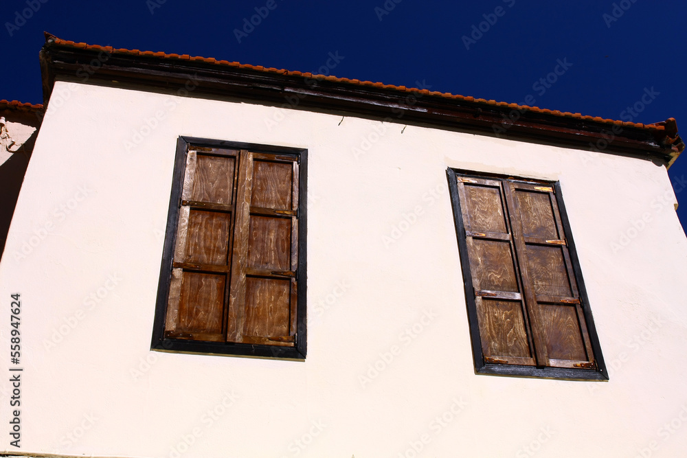 Wooden shutters on the windows, island of Rhodes.