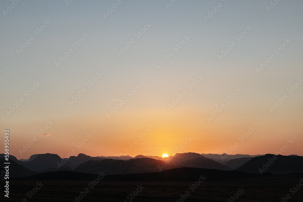 Sunset at the Wadi Rum desert landscape in Jordan Sunset at the Wadi Rum desert landscape in Jordan