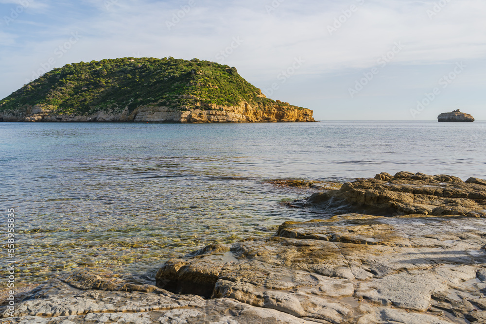 Views from the shore of the portichol beach. Cala Barraca on the Costa Blanca in Alicante, Spain.