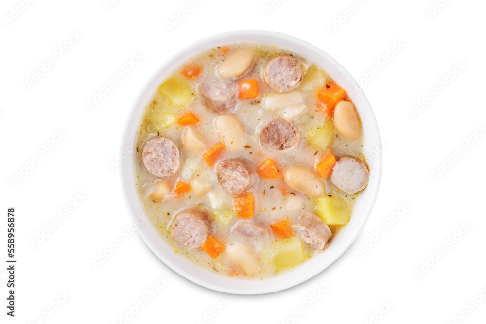 Potato carrot white bean soup with meat sausages in a bowl on a white isolated background Potato carrot white bean soup with meat sausages in a bowl on a white isolated background