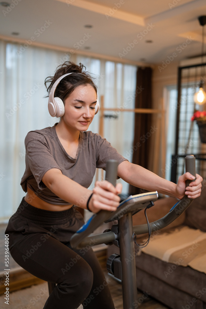 One woman young training on Indoor Cycling stationary Exercise Bike