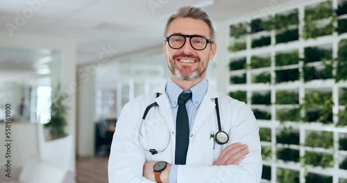 Face, man and doctor with arms crossed, healthcare and hospital for organic medicine, smile and treatment. Male, medical professional and surgeon with innovation for cure, research and natural care. photo