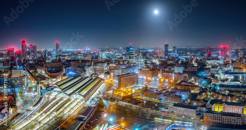 Picadilly train station Manchester City Centre and construction and redevelopment work at dawn with city lights and dark skies of this English city Fototapeta