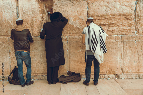 Fotografie Jewish men praying at the sacred Wailing Wall, Western Wall, Jerusalem