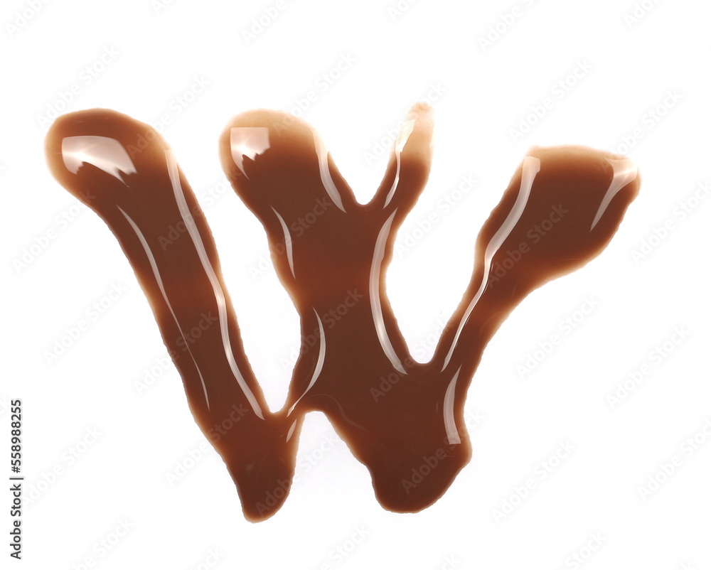 Spilled chocolate milk puddle in shape letter W isolated on white background, top view Spilled chocolate milk puddle in shape letter W isolated on white background, top view