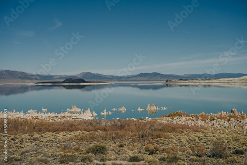 Tufa columns reflected in the mirrored water surface at Mono Lake  California