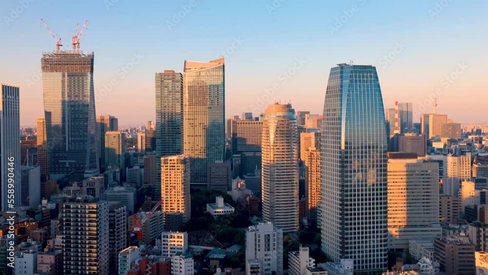Skyscrapers in Minato, Tokyo, Japan at sunset Skyscrapers in Minato, Tokyo, Japan at sunset