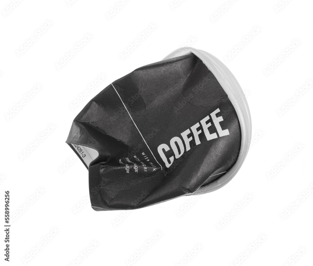 Naklejka premium Crumbled black paper coffee cup isolated on white background
