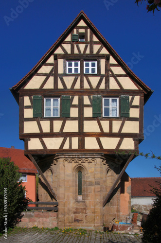 Conversion of the medieval hospital chapel of Heilsbronn monastery into a half-timbered residential house, Franken region in Germany photo