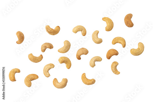 cashew nuts close-up scattered on white background, heap of roasted nuts isolated, snack food concept, vegan meal