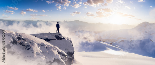 Adventurous Man Hiker standing on top of icy peak with rocky mountains in background. Adventure Composite. 3d Rendering rocks. Aerial Image of landscape from BC, Canada. Sunset Sky