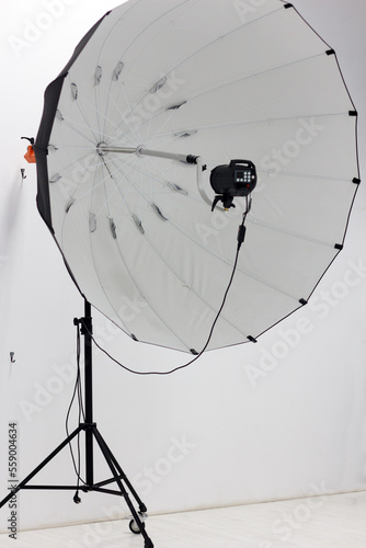 Professional studio large softbox on a tripod with wheels, for work of a photographer indoors and a photo studio photo