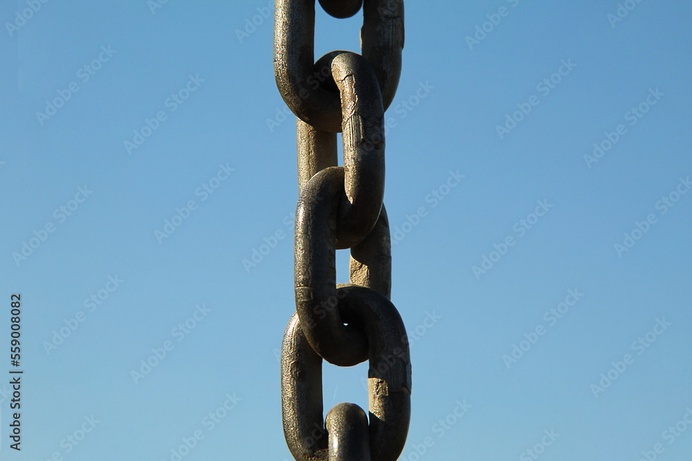 A chain in front of the blue sky A chain in front of the blue sky