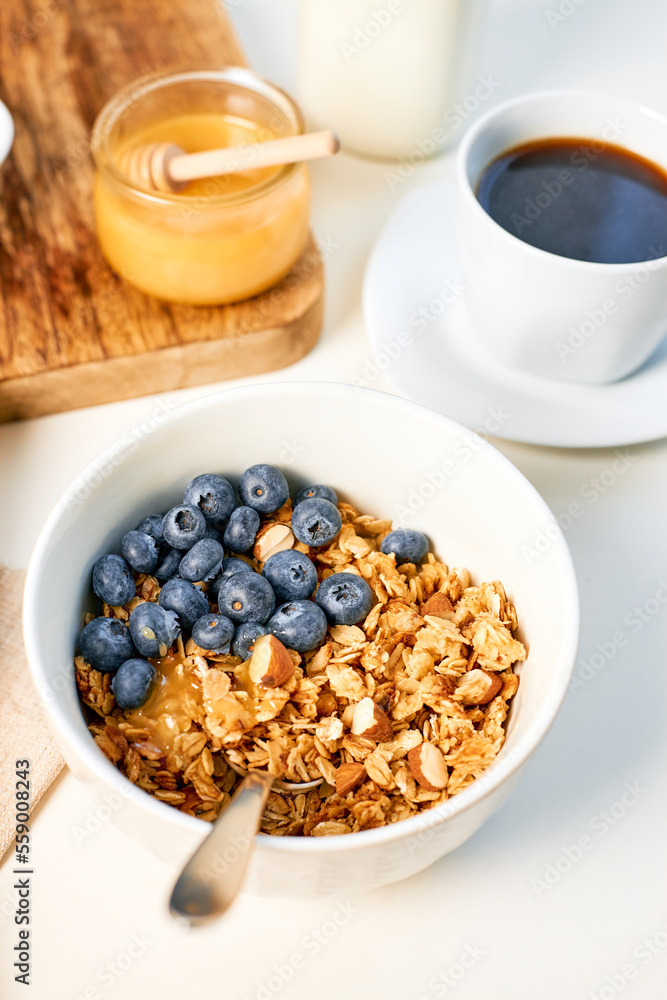 Homemade granola with nuts and fresh berries for breakfast. Proper balanced nutrition. Food for Vegetarians. Homemade granola with nuts and fresh berries for breakfast. Proper balanced nutrition. Food for Vegetarians.