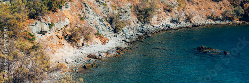 Kionia Beach swimming, the place to embrace the Aegean Sea, Tinos, Greece, banner size