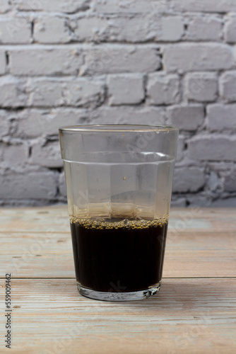 A cup of coffee. In Brazil called American glass, type of glass very common in bakeries and bars.
