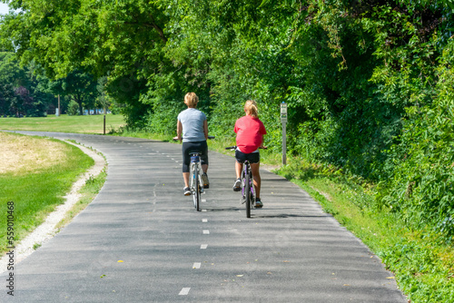 Wallpaper Mural Two People On Bicycles On The Trail In Summer Torontodigital.ca