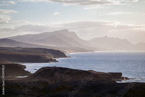 The west coast of Fuerteventura in the light fog as seen from the village of La Pared, Canary Islands, Spain