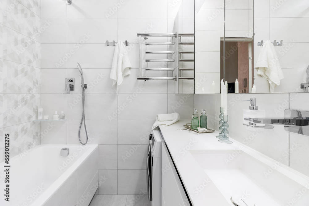 Bright elegant bathroom interior in a luxury house Bright elegant bathroom interior in a luxury house