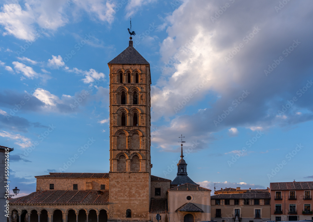 View of the San Estaban church in Segovia during a cloudy sunset